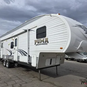 2011 Puma Unleashed 35' Toy Hauler 5th Wheel T/A Travel Trailer