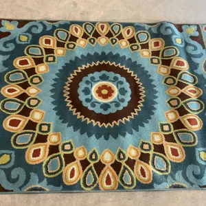 Hand-Tufted Area Rug with Central Medallion Design in Blue and Brown Tones 63 x 90