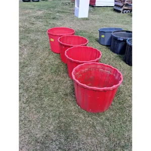 (4) Red Feed Tubs-1 cracked bottom