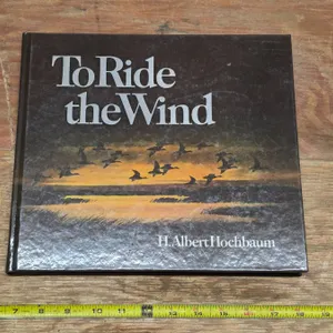 Hard cover book- to ride the wind
