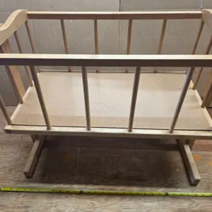 Wooden rocking doll cradle
