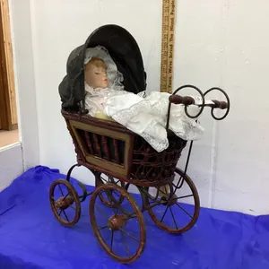 DOLL CARRIAGE W/ DOLL