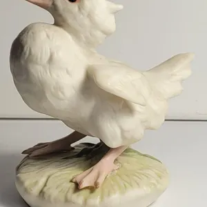 19) SWEET PORCELIAN  8" TALL DUCKLING