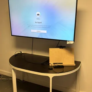 SAMSUNG 55" TV WITH WALL MOUNT/REMOTE, NEXIGO WEBCAM AND BLACK & WHITE HALL TABLE