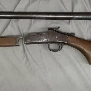 Disassembled vintage 12 ga. shotgun made by