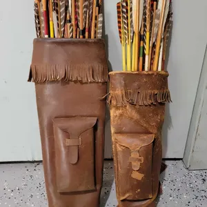 TWO Vintage Leather Quivers with Wood Shafted Arrows. Left quiver is probably Cowhide, right is probably Deerhide. Broaheads = 12 @ 30" + 3 @ 27&#