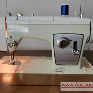 SEARS KENMORE Model 1750 Sewing Machine with BUTTONHOLER, Attachments, Cabinet, Instructions & More. Runs smoothly. Located in garage bring help t