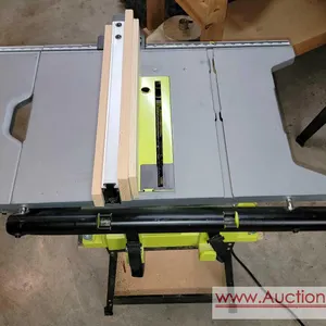 RYOBI 10" Portable Table Saw with QuickStand. FOUND MORE PARTS SEE PHOTOS. Plugged it in turned it on - sounded good - seems to function properly.