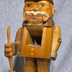 Hand Carved Nutcracker. 4 x 4 x 10. DR