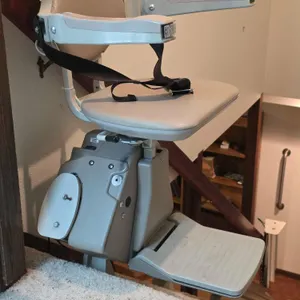 BRUNO SRE-3000 Straight Rail Stairlift. Works and has 2 Remotes and controls on the char arm. Only one remote responds. The Track is approximately 12 