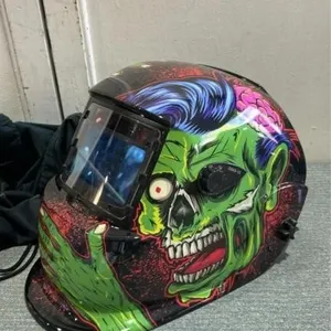 Auto darkening welding helmet