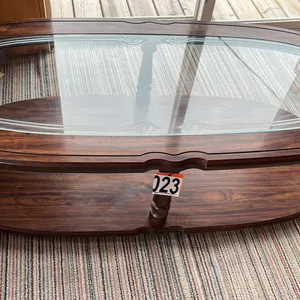 OFFSITE - Wood and glass coffee table in nice condition.