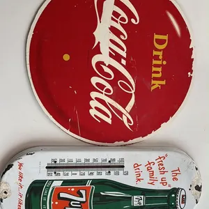 OFFSITE - Coca-Cola sign and 7 Up thermometer