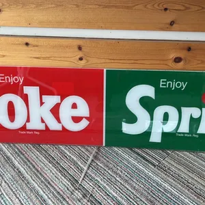 OFFSITE - Coke/Sprite sign, 14”x52 1/2”