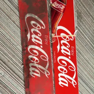 OFFSITE - 2 Coca-Cola signs, 13.5”x72”
