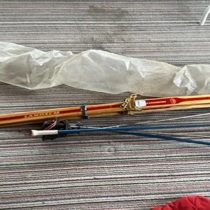 OFFSITE - Landsem Skis in good condition and 4 ski poles.