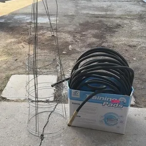 Garden Hose with Tomato Cages