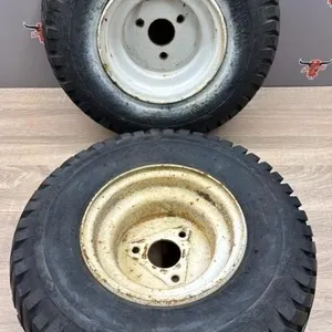 2 Goodyear 18x6.50-8 Tires on 3 Bolt Rims.