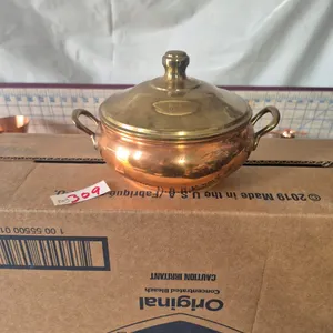 Vintage copper pot with brass lid.
Approximately 6 inches diameter. Commonly used casserole dish or Soup Bowl.