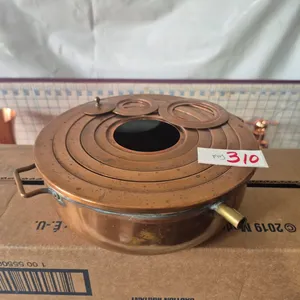 Vintage copper heating bath with concentric rings used for heating samples