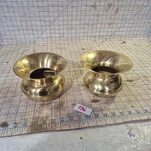 To brass spitoons.