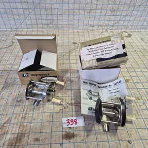 2 vintage bait fishing reels in the original boxes.