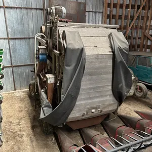 *OFFSITE* Grain cleaning mill with various size screens, comes mounted on running gear