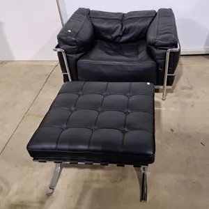 Knoll Inc Chrome black leather chair and ottoman