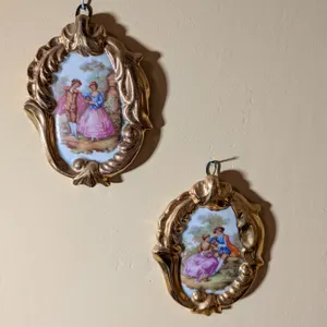 Pair of Limoges Porcelain d'Art Wall Plaques by Fragonard