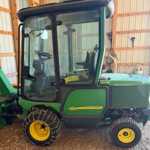 John Deere 1445 series II lawn tractor with 6’ lawn mower and 5’ snow blower