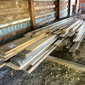 PILE OF ASSORTED LUMBER IN VARIOUS LENGTHS