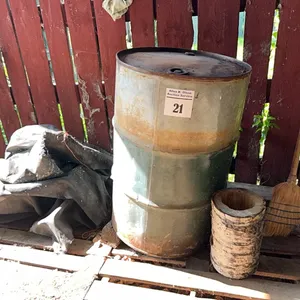 BARREL OF HYD. OIL (APPROX. 1/2 FULL)