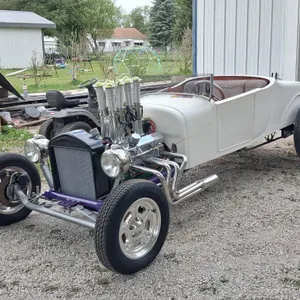 27 roadster set up for a small block & automatic transmission,  Including  following stuff:  Radiator shifter grill front brakes and headers . It has 