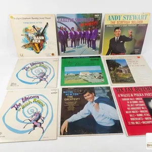 9 Assorted Vinyl Records