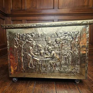 Embossed Metal Storage Chest With Figural Designs and Hinged Lid