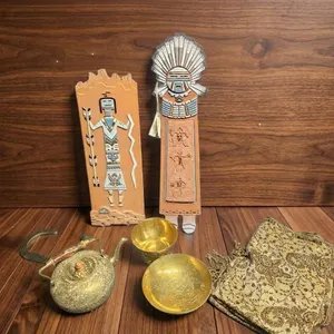 Handcrafted Decorative Items Including Kachina Wall Art and Brass Teapot