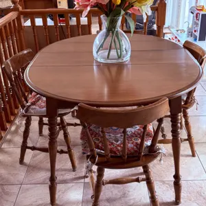Oval Extendable Oak Dining Table with Four Spindle-Back Chairs