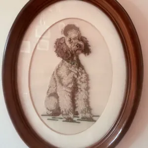 Framed Needlepoint Artwork Depicting a Poodle in Oval Wooden Frame