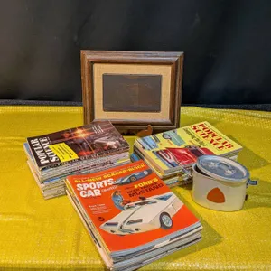 Framed Branding Stamp, 1950s-60s Popular Mechanics Magazines, and Metal Clasp Lock Container