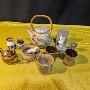 Clay Coffee Mugs, Bamboo-Handled Teapot, and Decorative Items