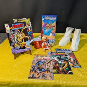 Novelty Boots, Comic Books, Doll, and Japanese Ceramic Clown Container