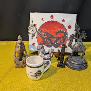 Region Decor Lot Featuring Indigenous Canvas and Middle Eastern Statue