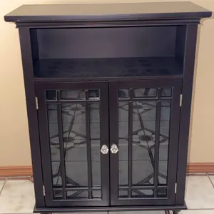 Black Wood Cabinet With Glass Panel Doors and Acrylic Knobs