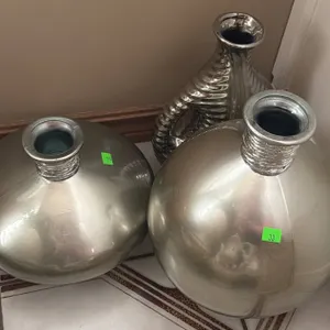 Three Silver-Tone Decorative Vases with Varied Designs