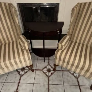 Upholstered Wingback Armchairs and Wood Demilune Table