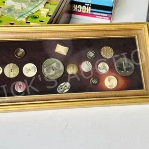 framed vintage button collection