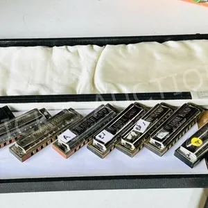 8 Hohner Marine band harmonics in case
