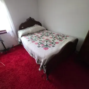 Vintage Wooden Bed Frame with Quilt