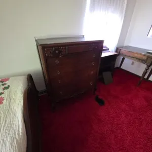 Antique Wooden Dresser with Ornate Carvings