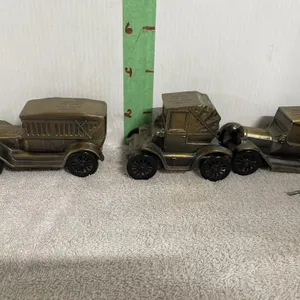 Three Osh Kosh Metal Banks